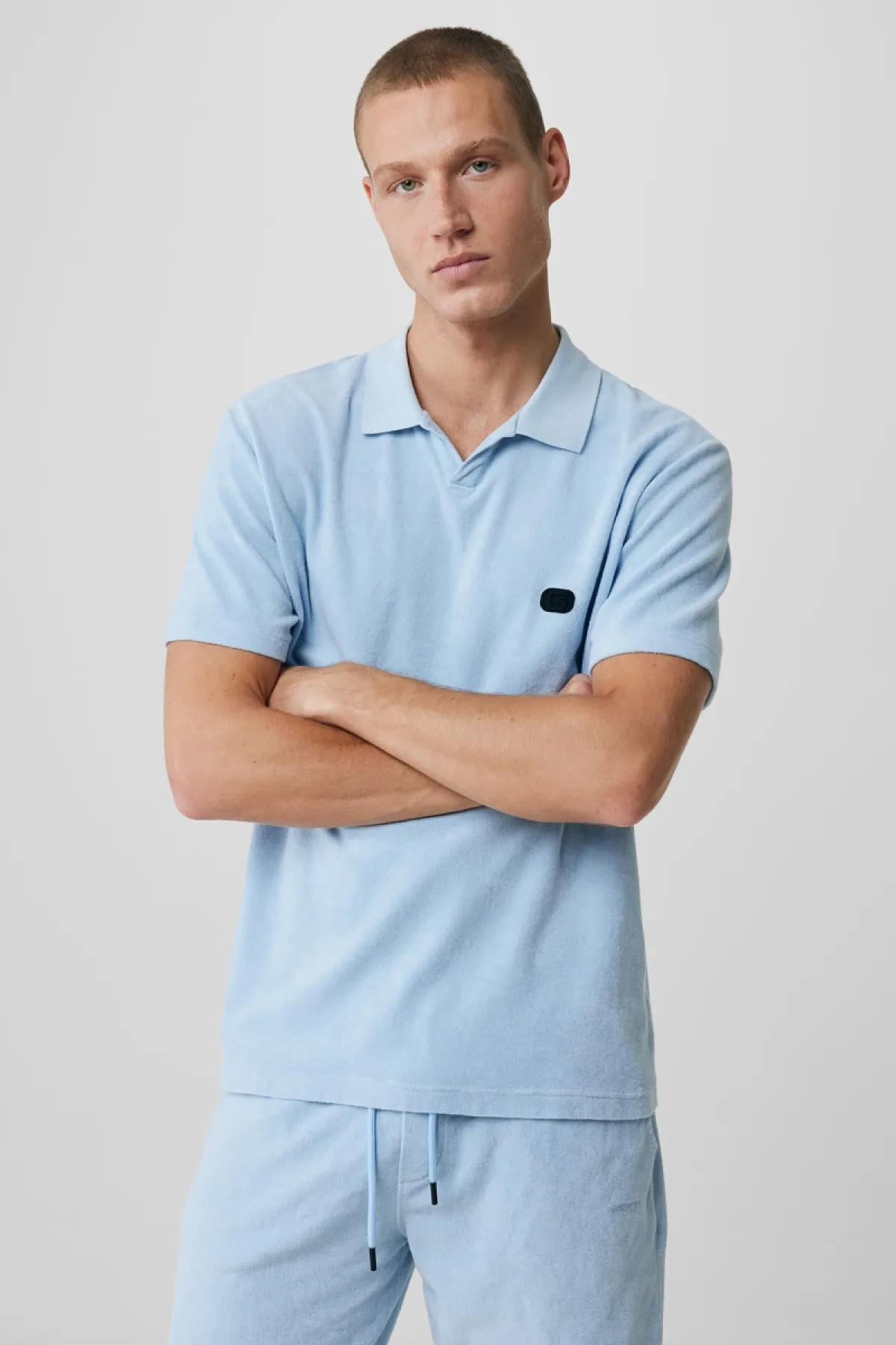 No button polo lichtblauw
