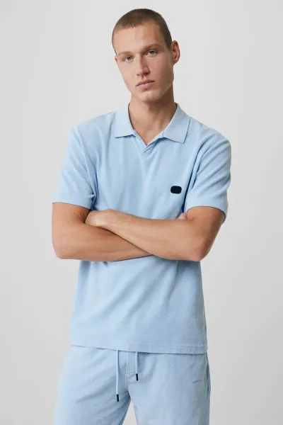 No button polo lichtblauw
