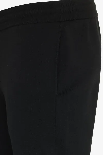Monogram Raye Trousers | Zwart
