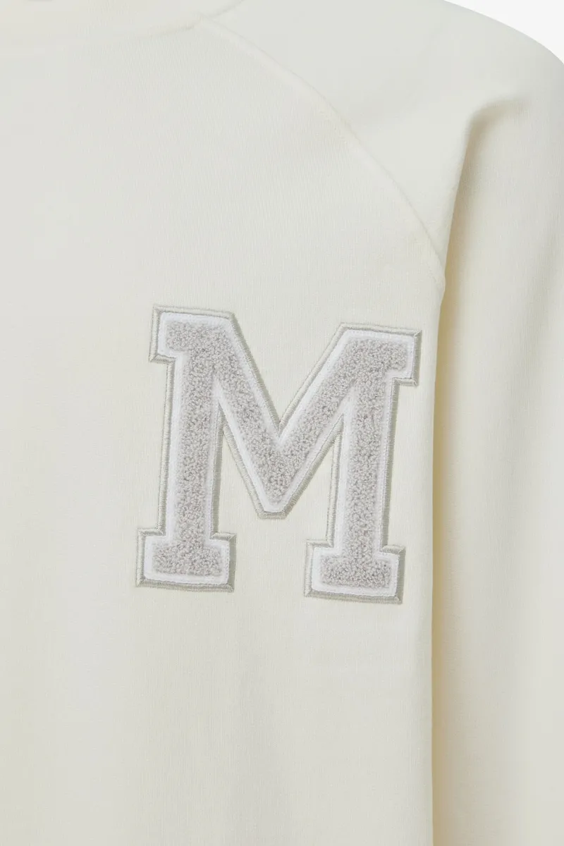 Monogram raglan crewneck | Off white
