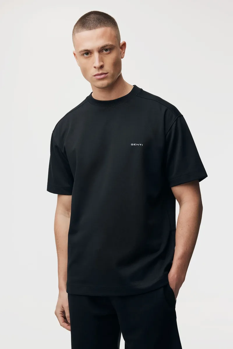 Relaxed fit T-shirt Backprint | Zwart