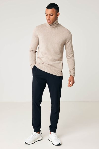 Merino stretch roll neck beige