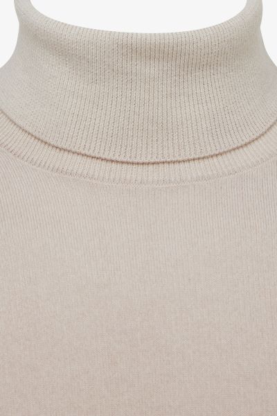 Merino stretch roll neck beige