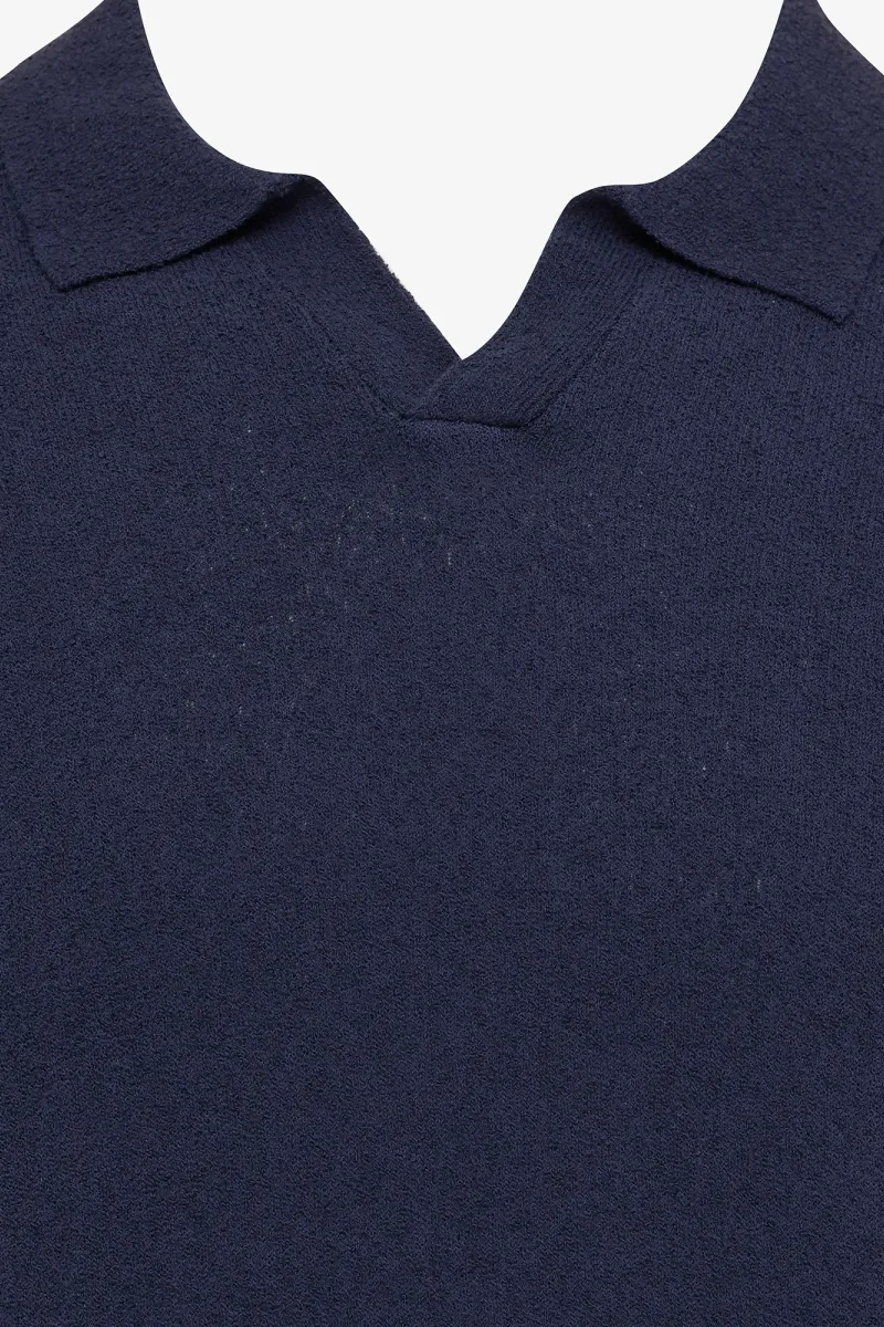 No button polo blauw